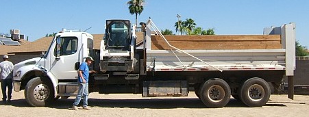 Dump Truck with Bobcat